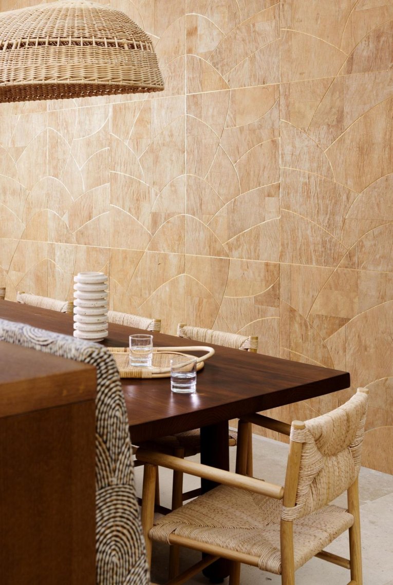 Natural wall covering installed in interior setting.