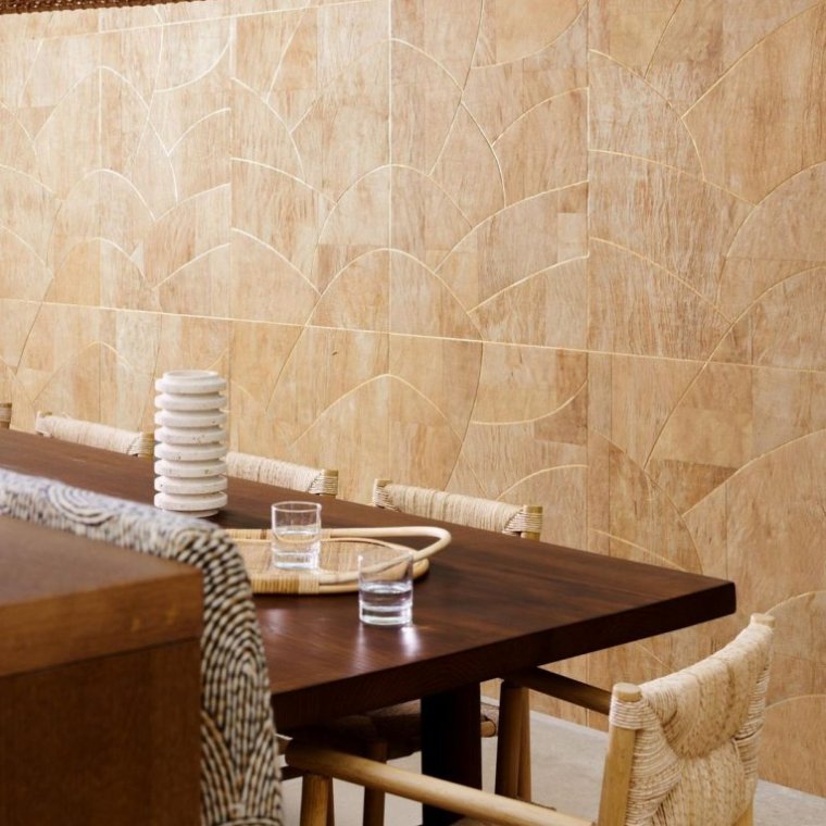 Natural wall covering installed in interior setting.